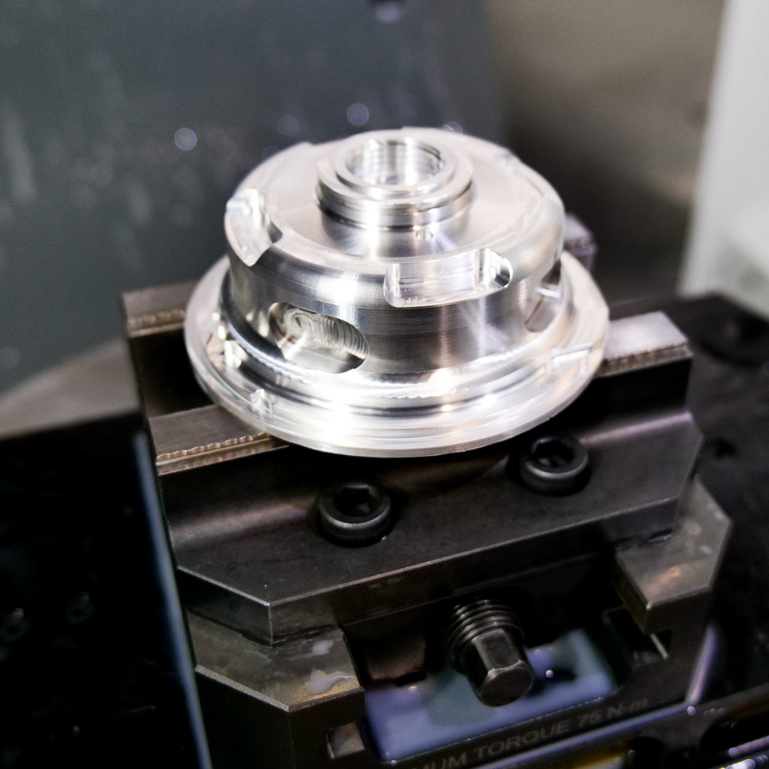 During 5 Axis Manufacturing